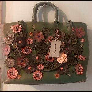 COACH
Tea Rose Rogue Bag in Dark Green